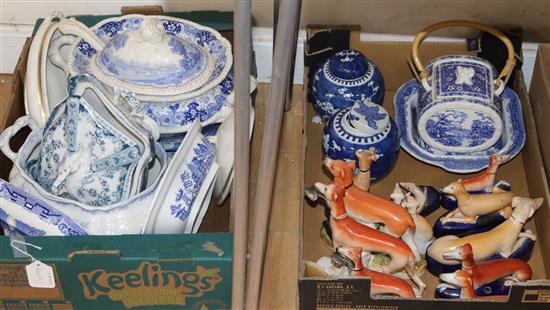 A collection of Staffordshire dogs plus small group of blue and white ceramics